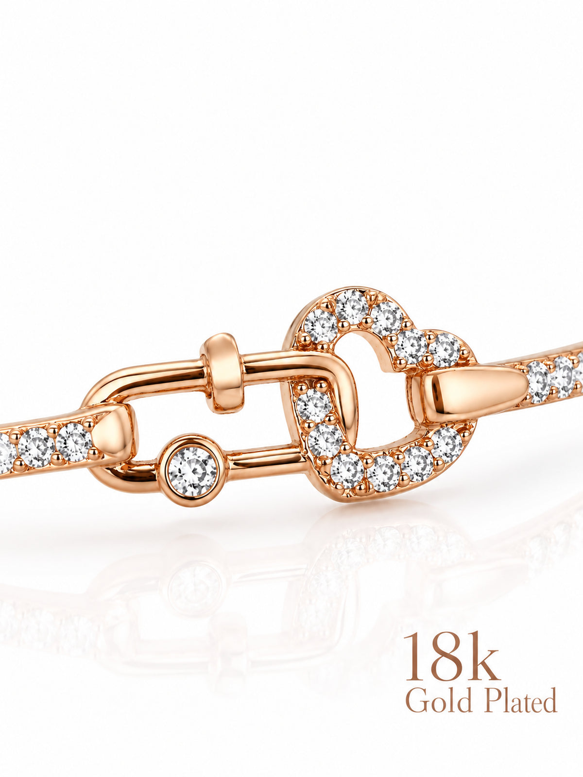 Close-up of Love Lock Heart bracelet showing the open heart and clear stone details