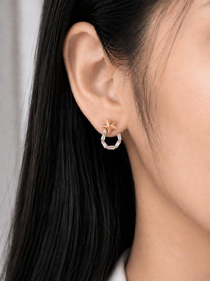 Celestial Star 18K Rose Gold Plated Drop Earrings worn on a model's ear