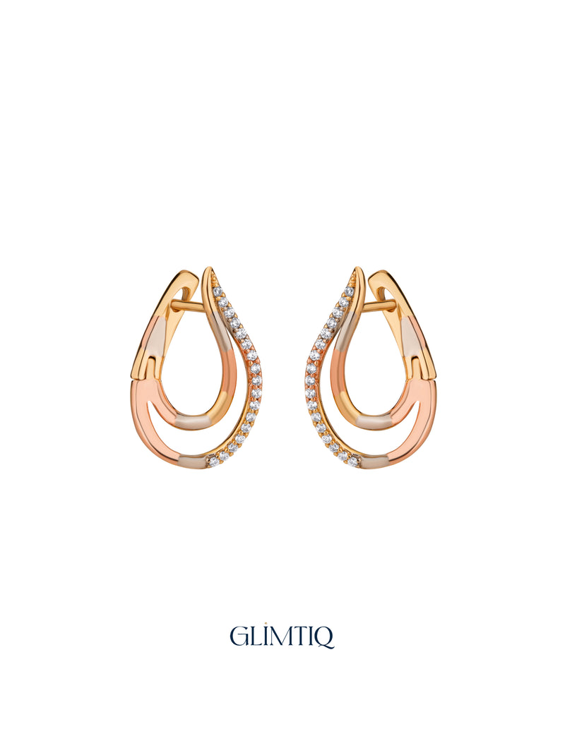 Pair of Golden Swoop 18K Gold Plated Huggie Earrings, studio view