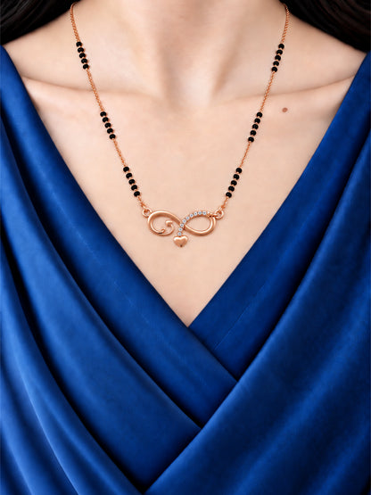 Infinity Love Charm mangalsutra with black beads shown worn on a model.