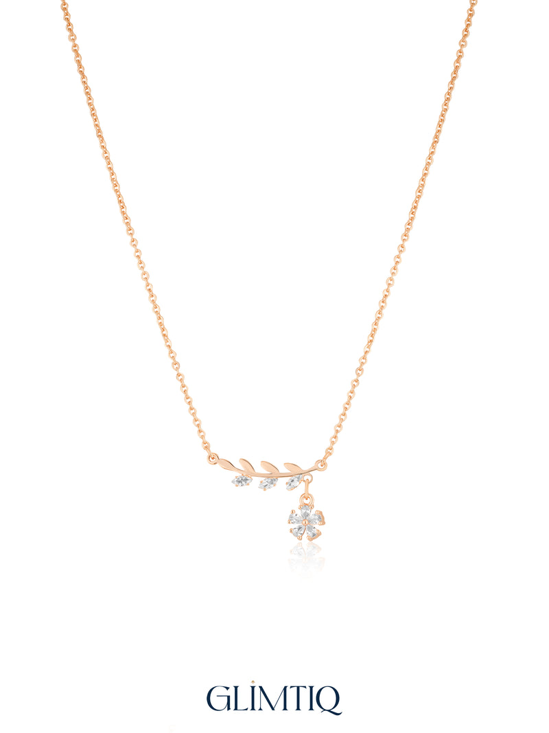 Leafy Flower Drop 18K Gold Plated Necklace studio view showing the front design and chain
