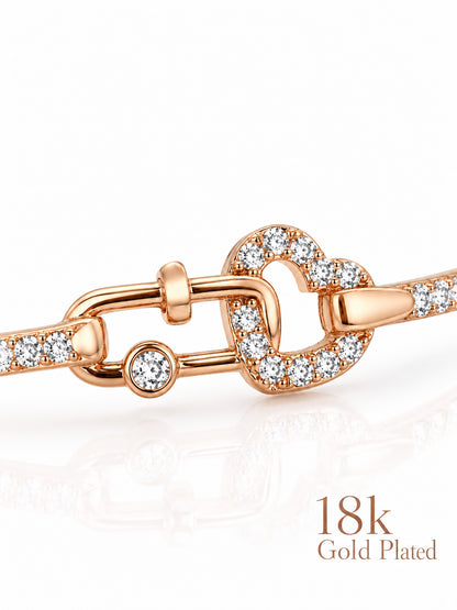 Close-up of Love Lock Heart bracelet showing the open heart and clear stone details