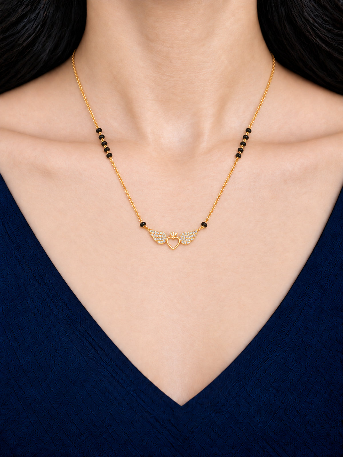Model wearing Angel Winged Heart mangalsutra