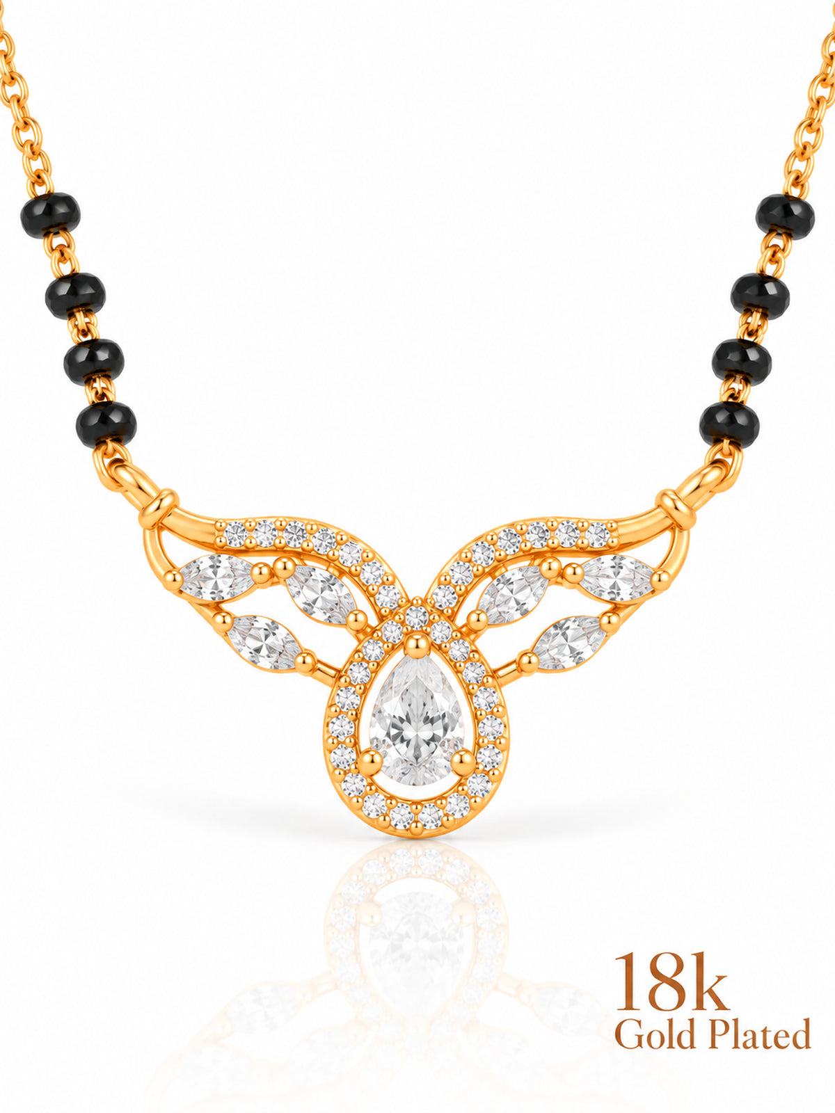 Close-up of Pear Halo Winged Arc pendant and gold plating mark