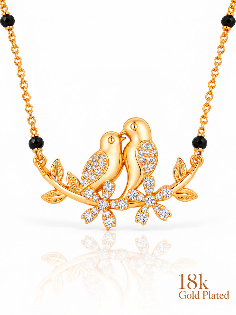Close-up of Lovebirds on Branch pendant and gold plating mark