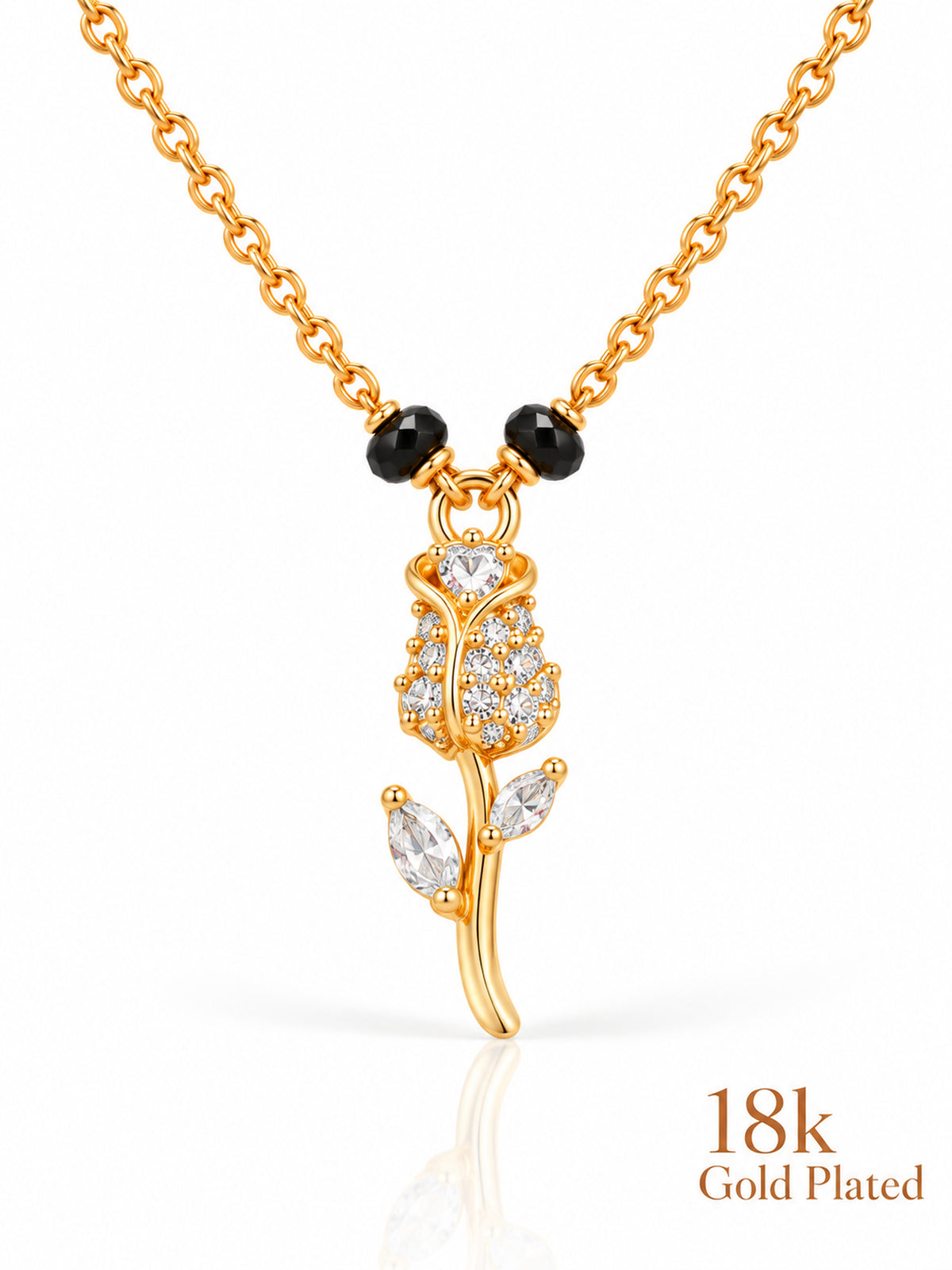 Close-up of Rose Stem pendant and gold plating mark