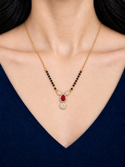 Model wearing Dual Halo Solitaire Drop 18K Gold Plated Mangalsutra with Red centre stone
