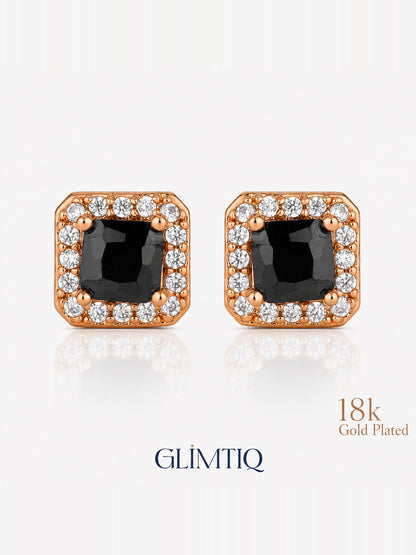 Close view of the pair of square black-centre earrings with clear accent borders