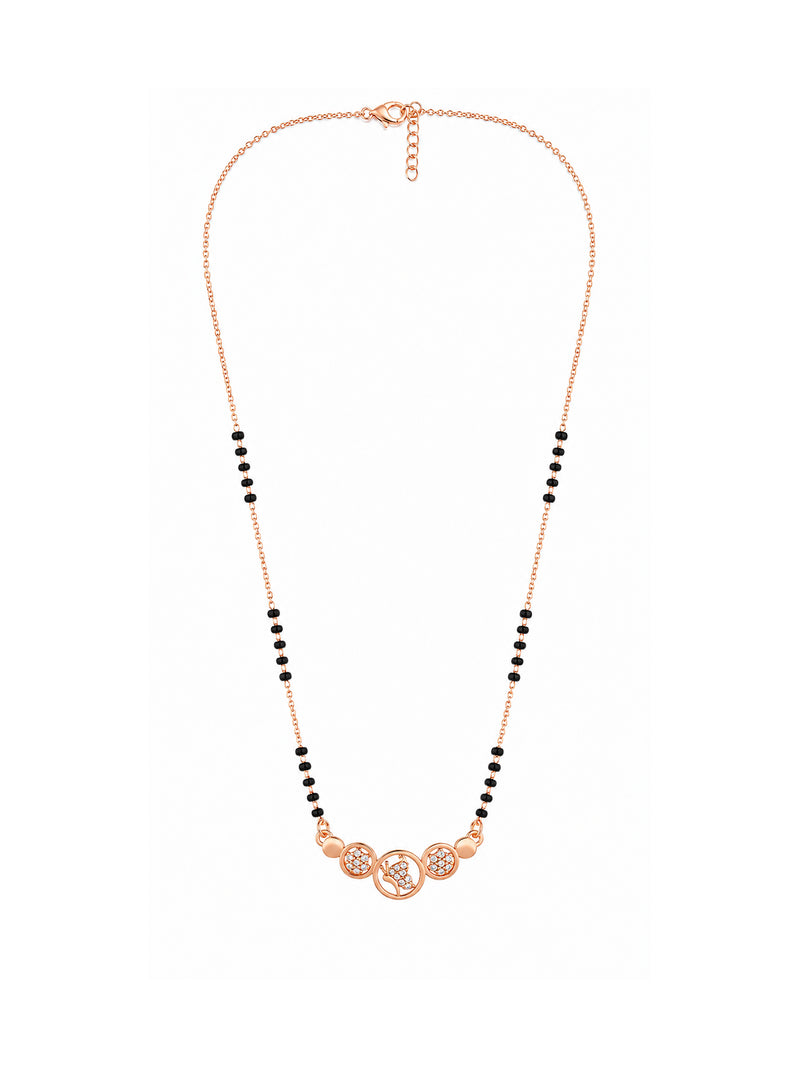 Full rose gold mangalsutra showing black bead sections, peacock motif in a centre circle with two sparkling floral circles, lobster clasp and extension chain.
