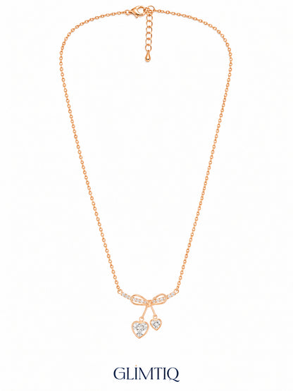 Full view of Ribbon Bow Dual Heart 18K Gold Plated Necklace showing its chain, clasp and extender