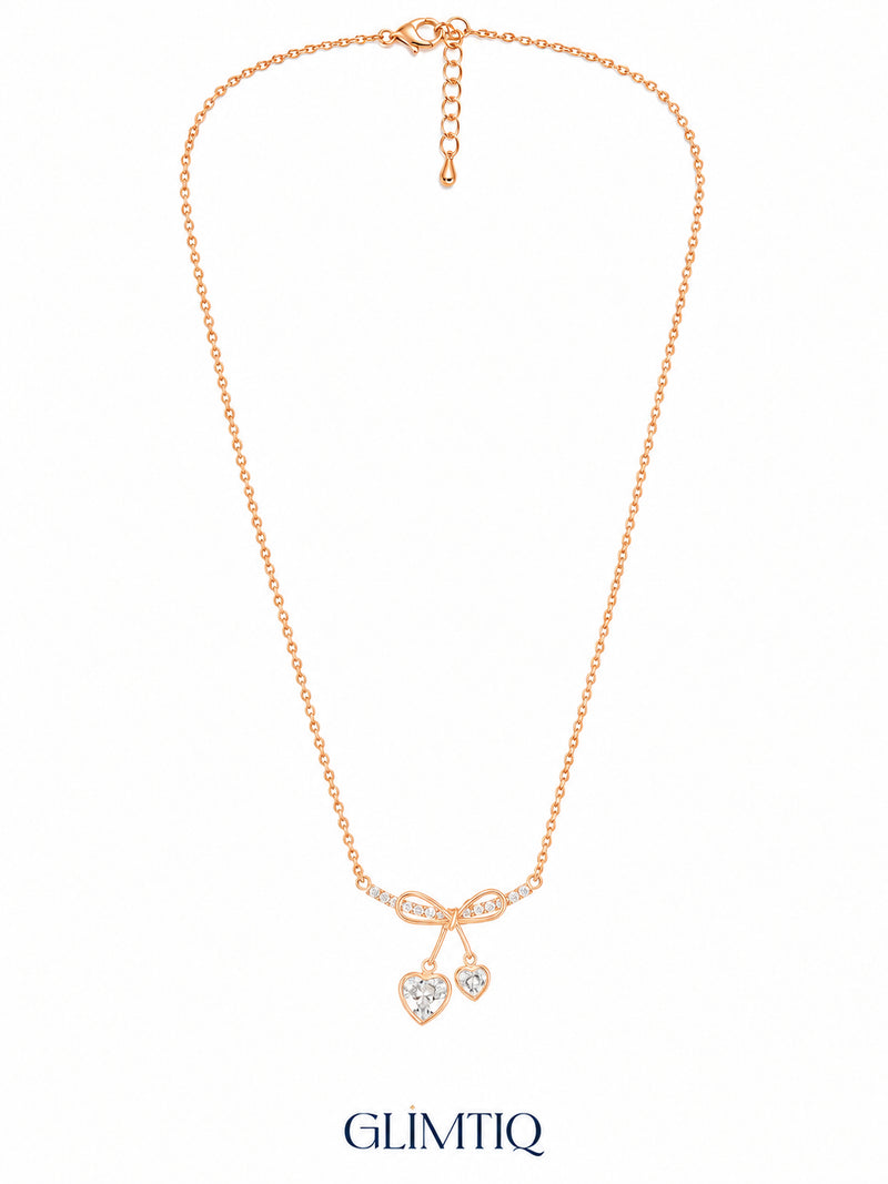 Full view of Ribbon Bow Dual Heart 18K Gold Plated Necklace showing its chain, clasp and extender