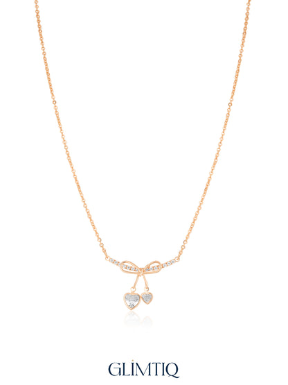 Ribbon Bow Dual Heart 18K Gold Plated Necklace studio view showing the front design and chain