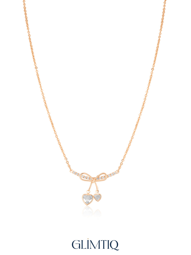 Ribbon Bow Dual Heart 18K Gold Plated Necklace studio view showing the front design and chain