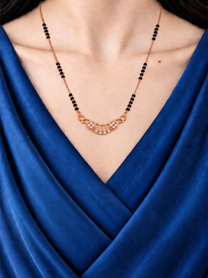 Shining Twin Flower Crescent mangalsutra with black beads shown worn on a model.