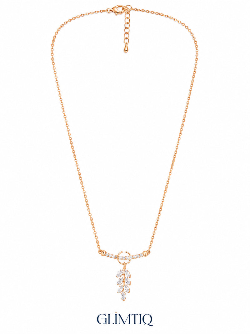 Full view of Sparkling Leaf Drop gold necklace showing chain, extender and leaf pendant