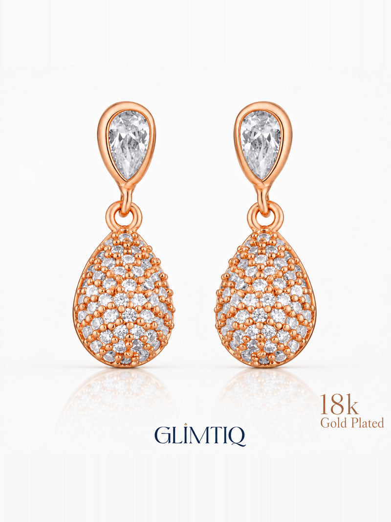 Close view of teardrop cascade 18k rose gold plated drop earrings showing clear teardrop top with sparkling teardrop drop