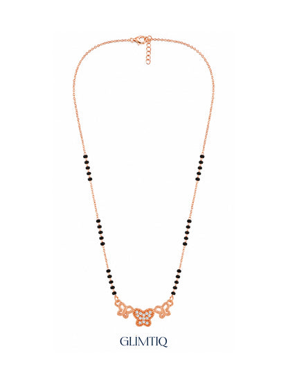 Full rose gold mangalsutra showing black bead sections, three-butterfly pendant with a sparkling centre butterfly, lobster clasp and extension chain.