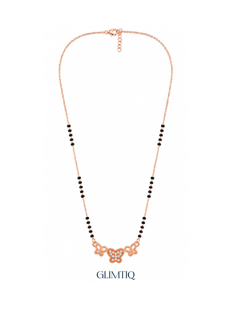 Full rose gold mangalsutra showing black bead sections, three-butterfly pendant with a sparkling centre butterfly, lobster clasp and extension chain.