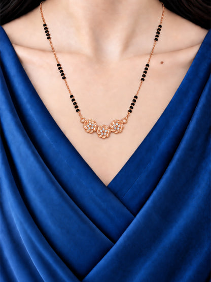 Three Sparkling Roses mangalsutra with black beads shown worn on a model.