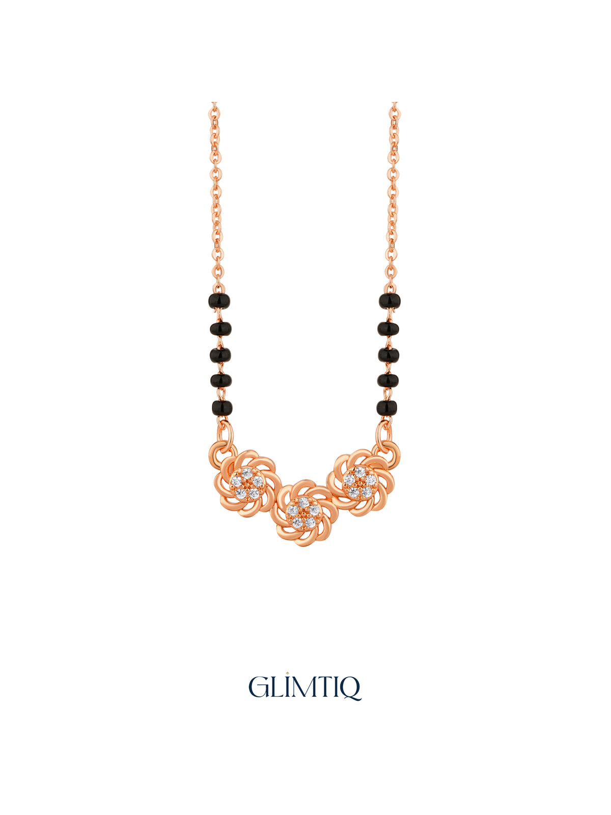 Close-up of rose gold mangalsutra pendant featuring three sculpted rose swirls with sparkling floral centres.