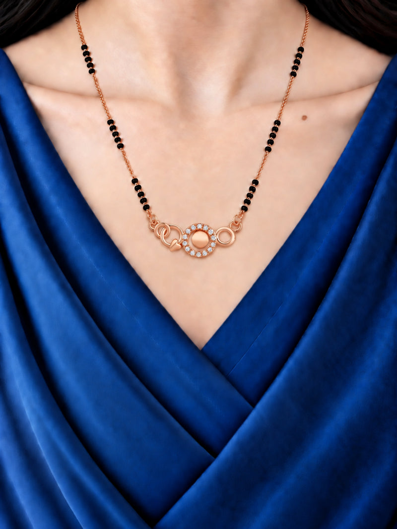 Twin Love Circles mangalsutra with black beads shown worn on a model.