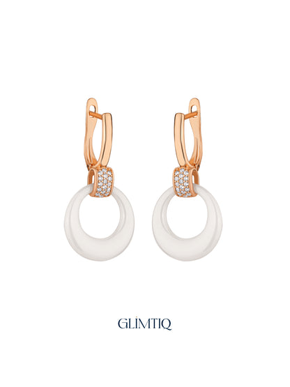 Pair of White Halo 18K Rose Gold Plated Drop Earrings, studio view