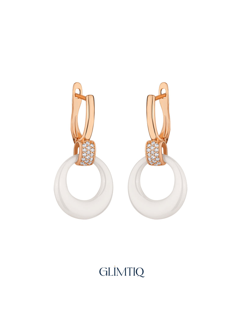 Pair of White Halo 18K Rose Gold Plated Drop Earrings, studio view